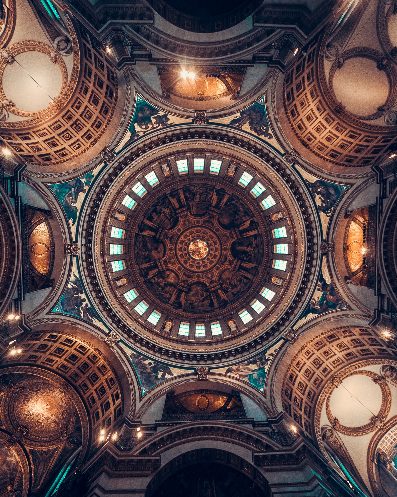 Looking up at the ornate painted ceiling inside St Paul’s Cathedral.